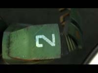 From this angle, it looks like two letters currently seen in the corner of your screen during Toonami.